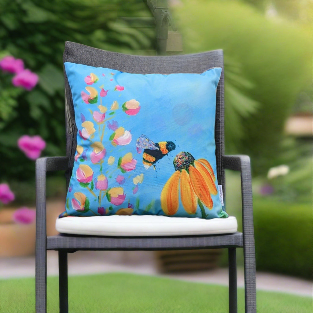 outdoor cushion with bumblebee print. Artist Caroline Dilworth. Les Papillons Northern Ireland