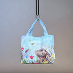 Load image into Gallery viewer, handbag with hare and Bee printed on it
