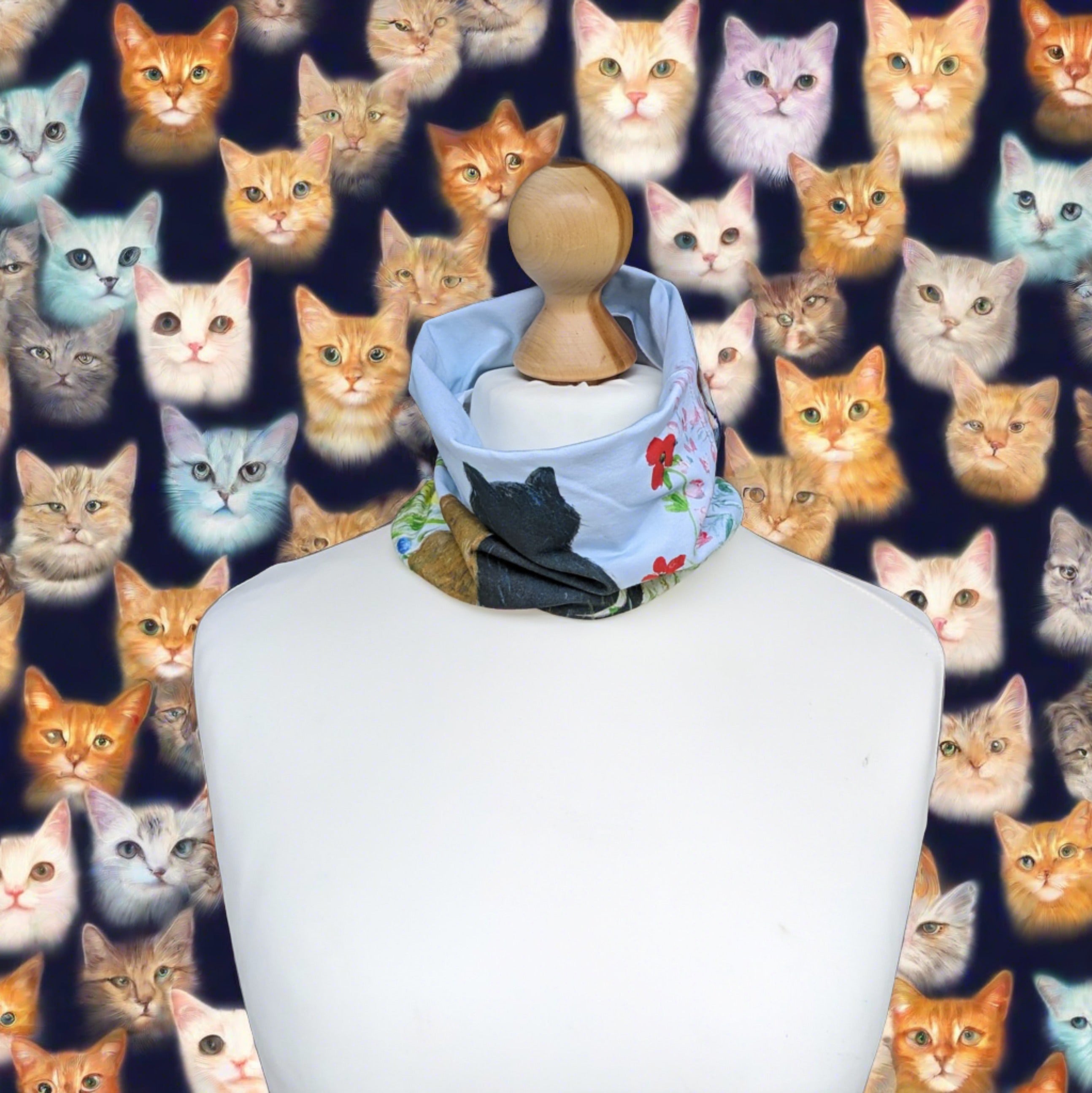 neck snug with cats in a garden