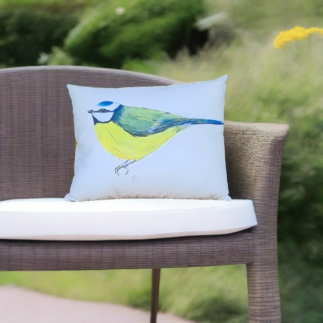 Outdoor cushion. printed with a blue tit. Painted by Caroline Dilworth, Fermanagh Artist. Made in Ireland